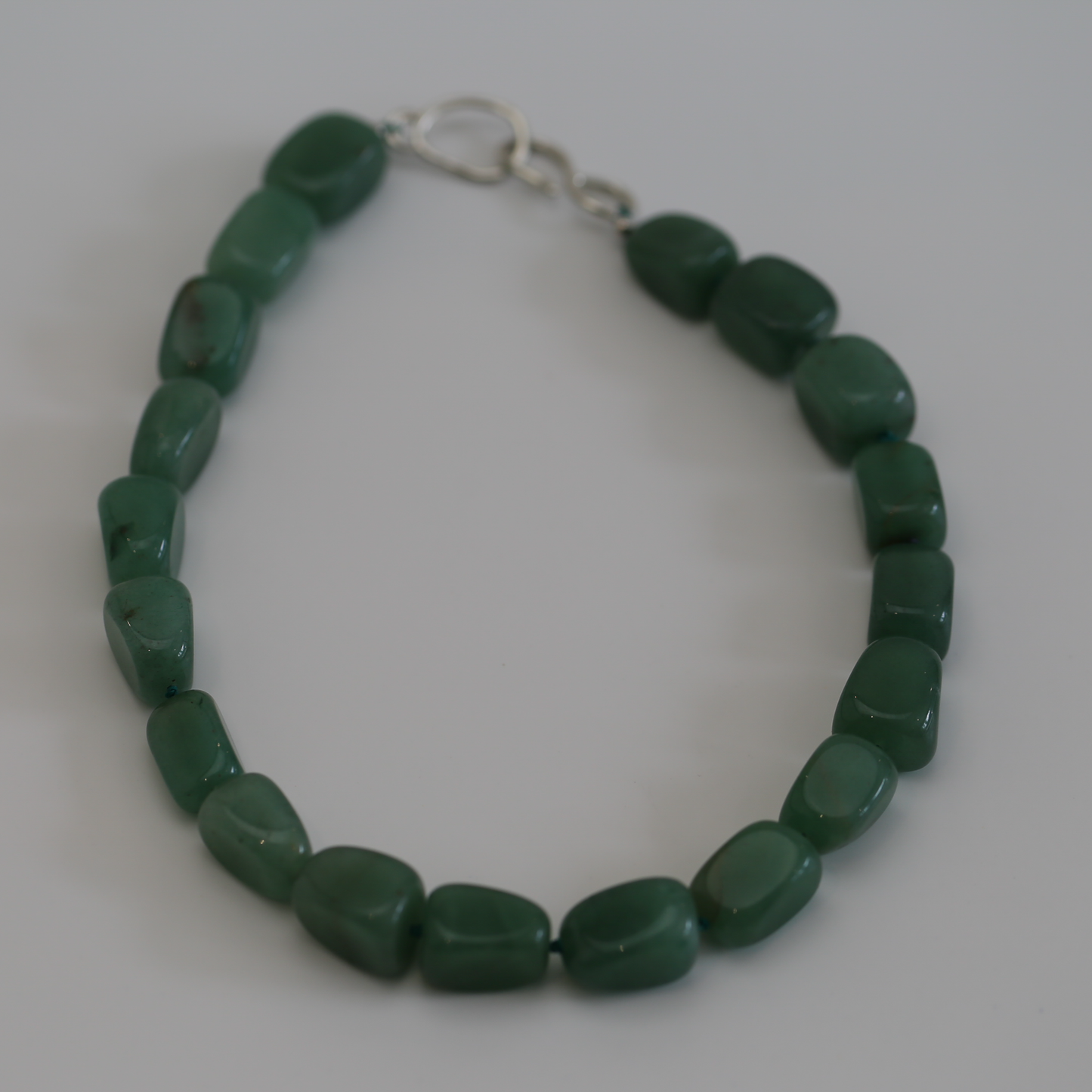 THE STREAM SONG NECKLACE - Single Gemstone necklace beads shaped like pebbles.