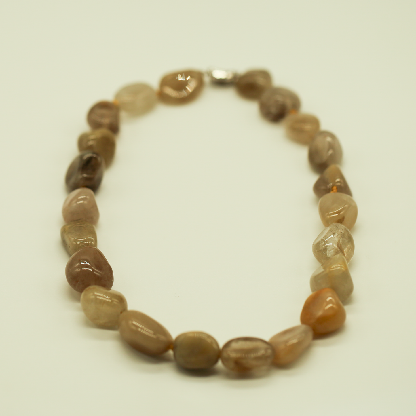 THE STREAM SONG NECKLACE - Single Gemstone necklace beads shaped like pebbles.