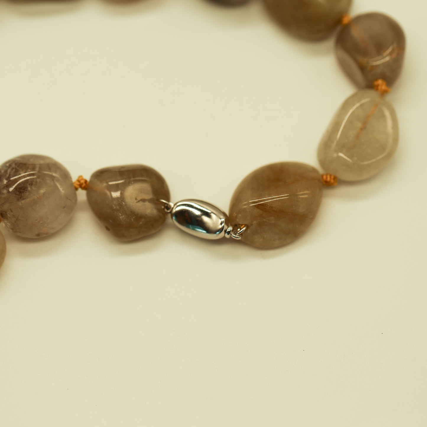 THE STREAM SONG NECKLACE - Single Gemstone necklace beads shaped like pebbles.