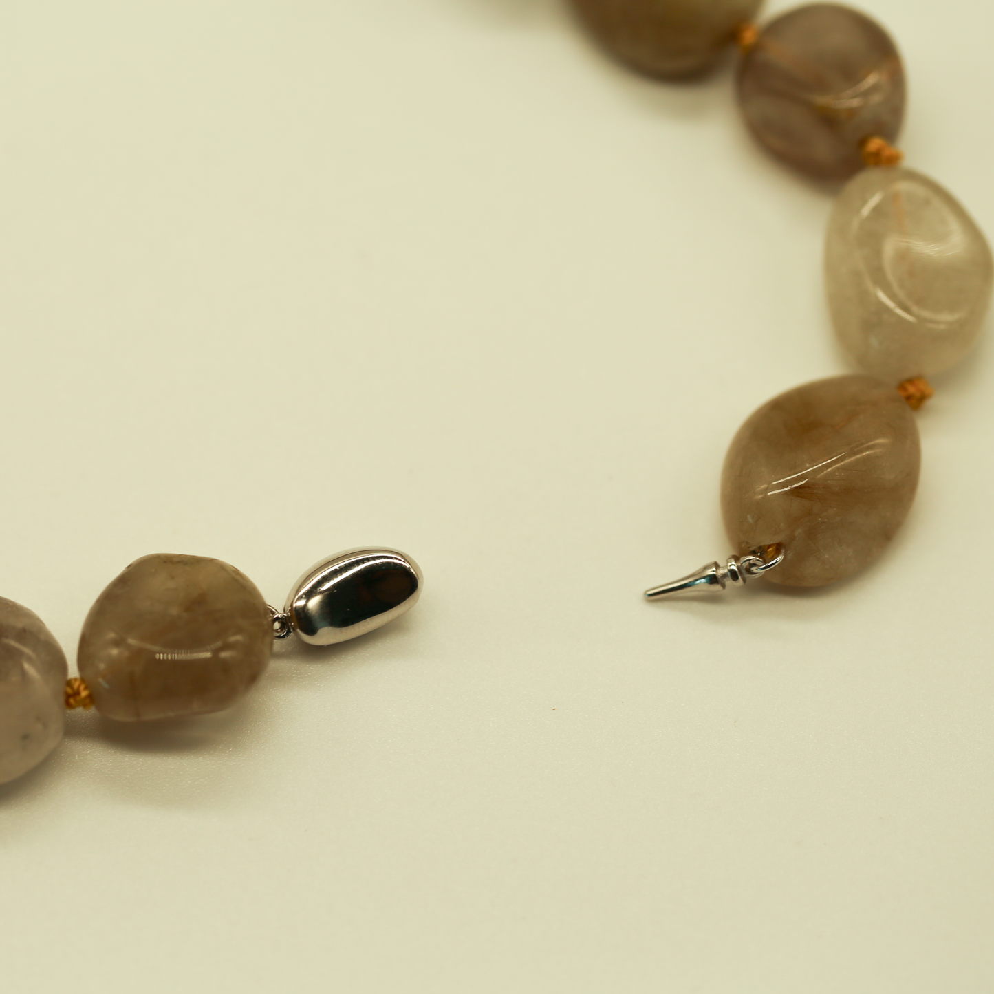 THE STREAM SONG NECKLACE - Single Gemstone necklace beads shaped like pebbles.
