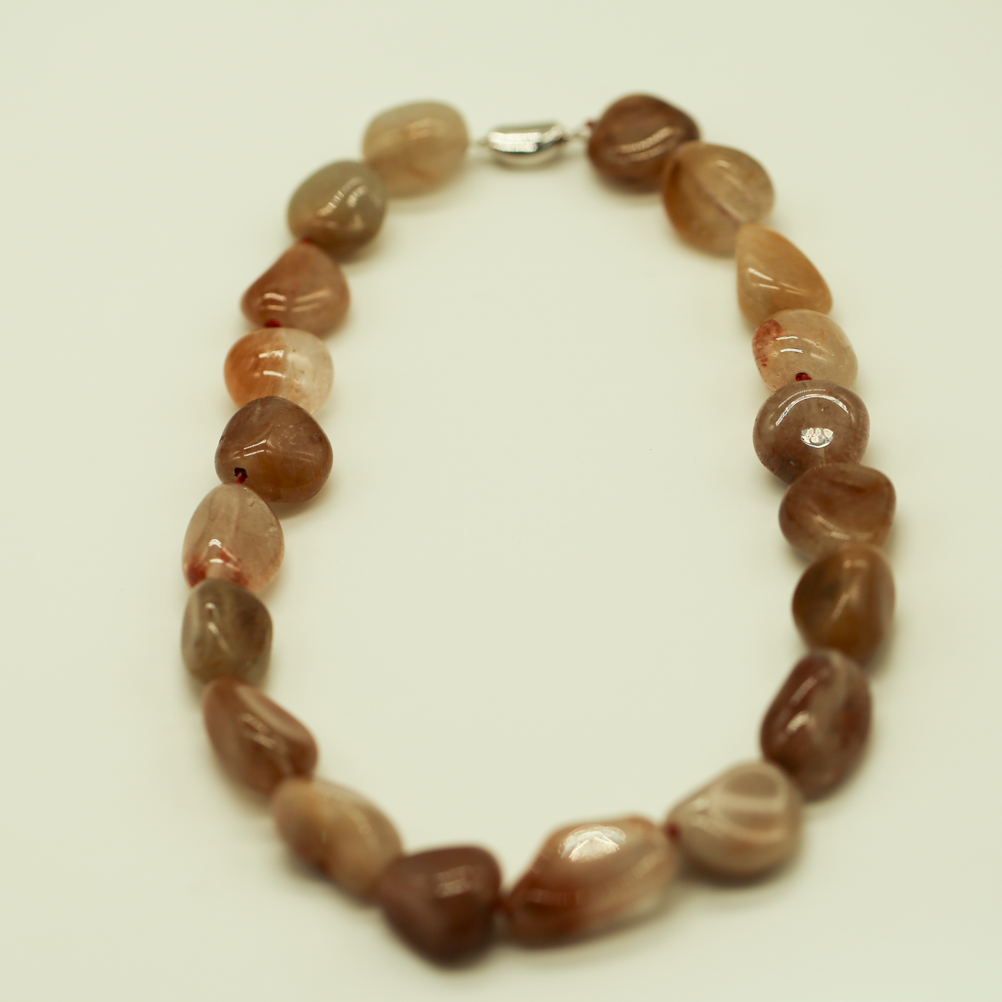 THE STREAM SONG NECKLACE - Single Gemstone necklace beads shaped like pebbles.