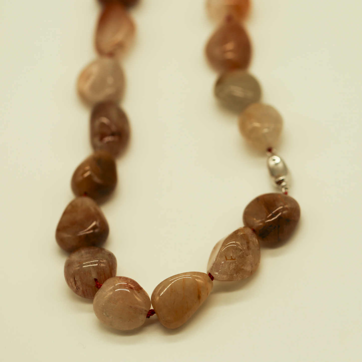 THE STREAM SONG NECKLACE - Single Gemstone necklace beads shaped like pebbles.