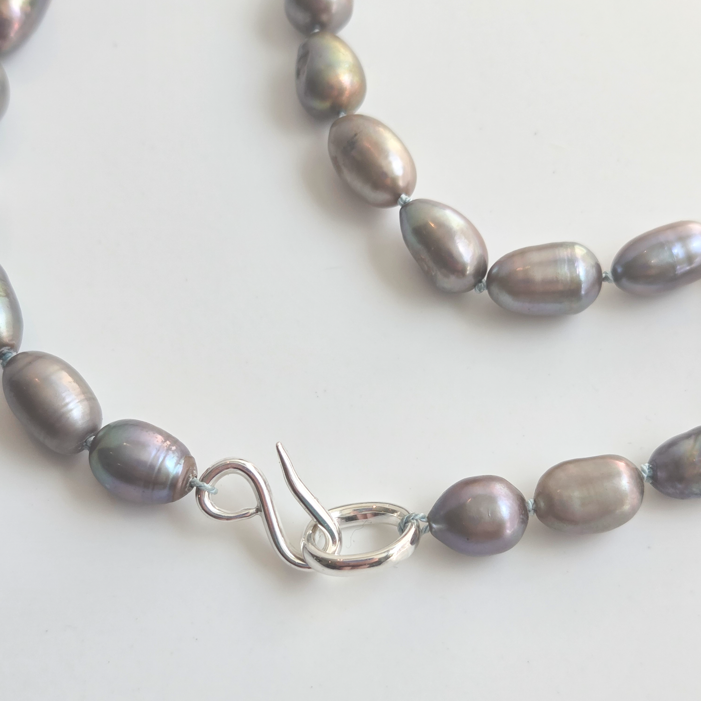 THREADED LIGHT - A contemporary strand of freshwater pearls
