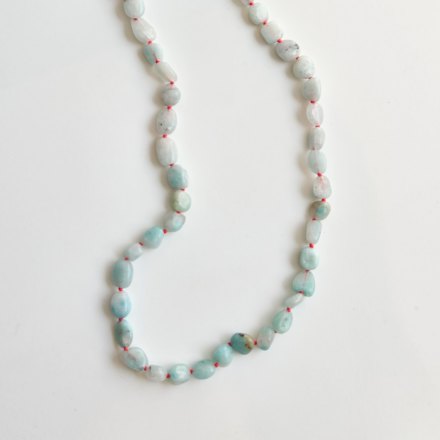 THE STREAM SONG NECKLACE - Single Gemstone necklace beads shaped like pebbles.