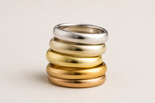 Stack of rings in 14K and 18K white and yellow gold
