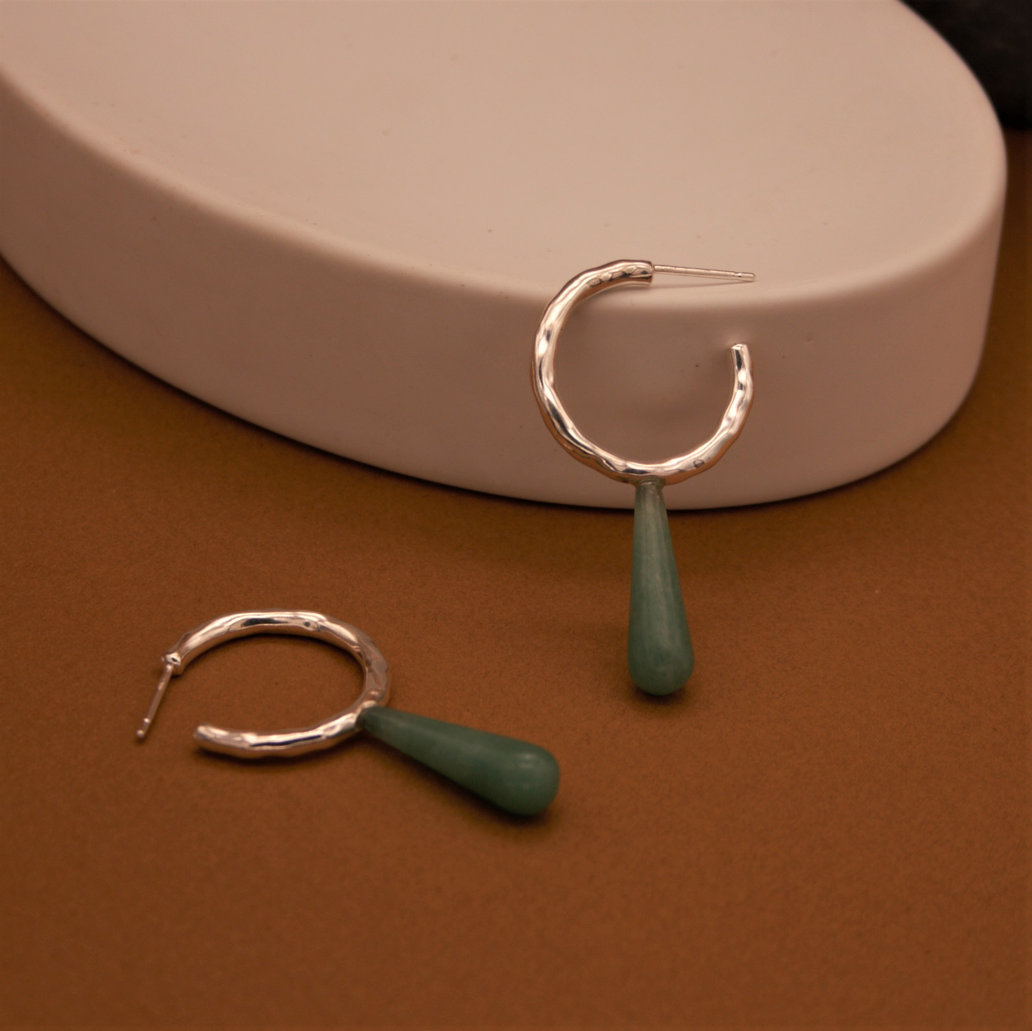 Women wearing hoop earrings