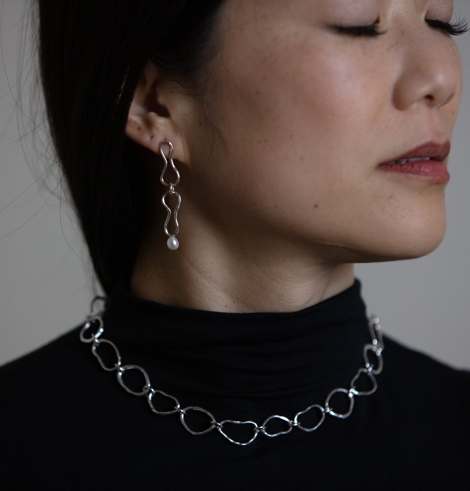 Sterling silver handcrafted chain in organic shapes and flowing texture