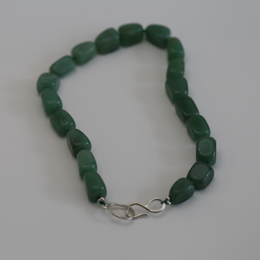 THE STREAM SONG NECKLACE - Single Gemstone necklace beads shaped like pebbles.