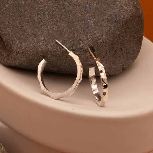SWELL HOOP EARRINGS left